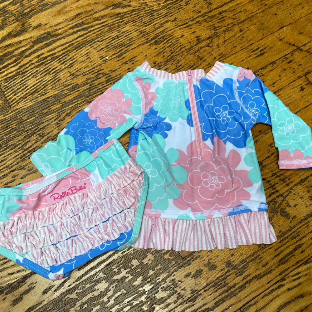 Sweetest little swim suit that will keep shoulders from burning!  Ruffle Butts